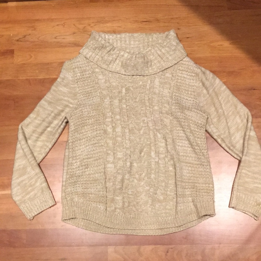 Knit sweater.